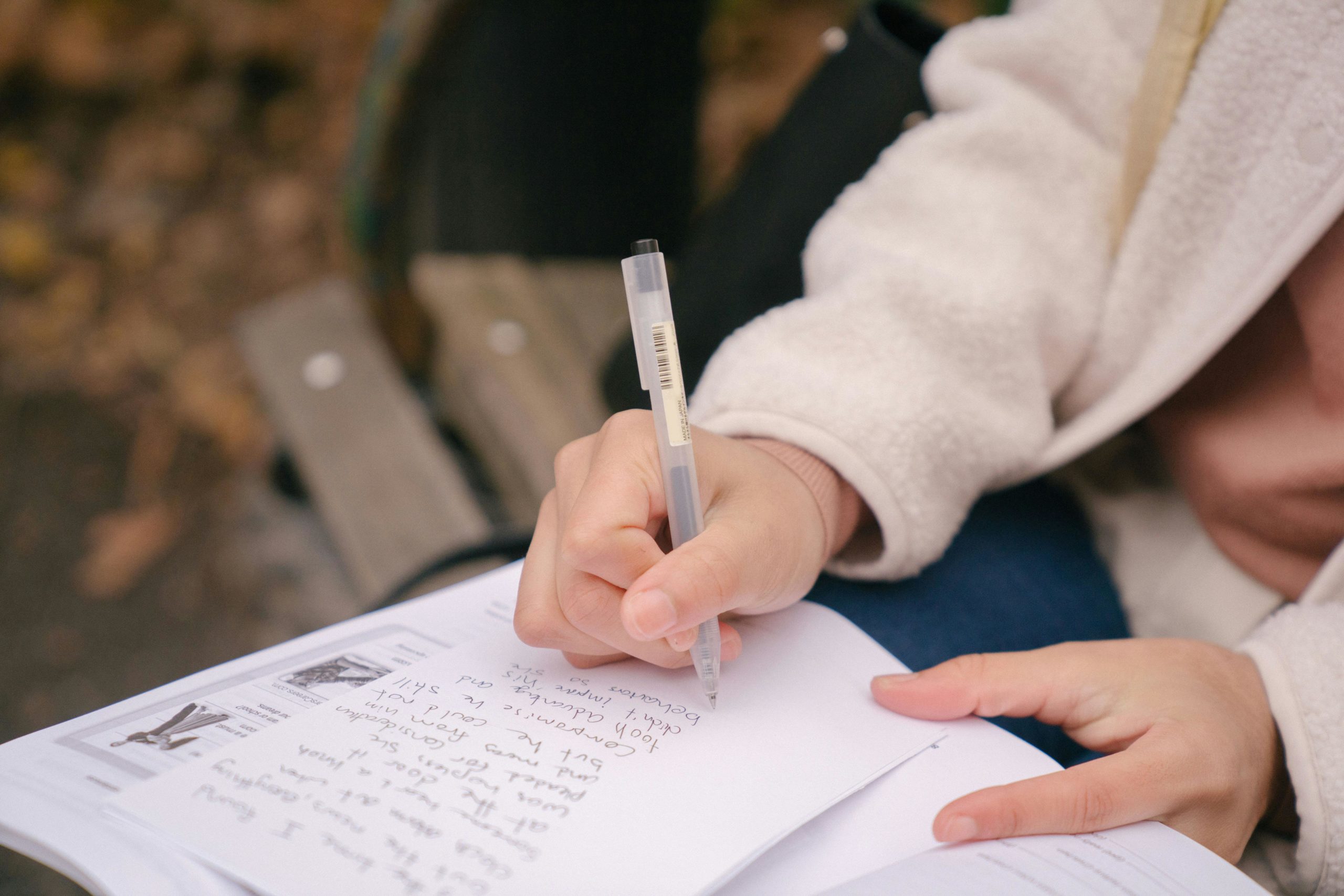 pexels-budgeron-bach-6532568 boy writing